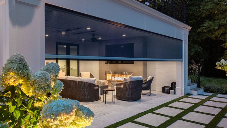 Motorized retractable patio screen deploying smoothly with even tension and perfect alignment